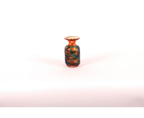 A coloured Art glass baluster vase, having blue latticed decoration on a ruby ground, 15cm high