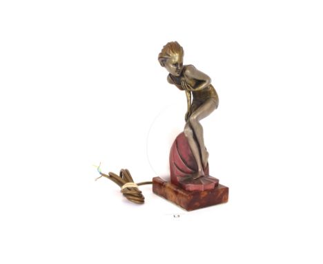 An Art Deco style table lamp, in the form of a Lorenzl bathing figure, 27cm high