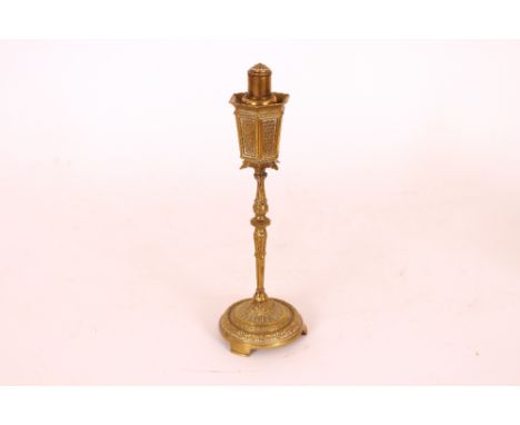 A brass table lighter, in the form of a street lamp, 23cm high