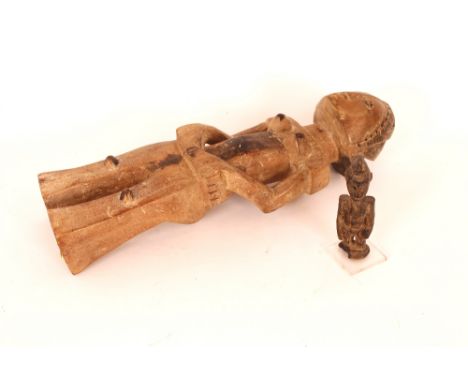 An unusual vintage African tribal carving, 46cm high; and a smaller example set on a Perspex stand probably from Iain Auld Ca