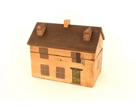 A wooden tea caddy, in the form of a house