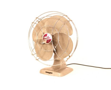 A Revelair vintage desk fan