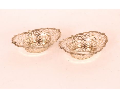 A pair of oval pierced silver bon bon dishes, Birmingham 1911