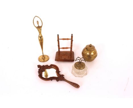 A Victorian walnut pipe rack; a modernist brass figure; a brass Lipton's tea caddy; a Victorian inkwell and a carved wooden h