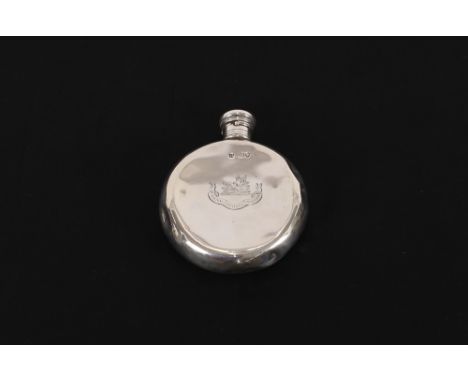 A small circular silver hip flask, bearing family crest, London date letter indistinct