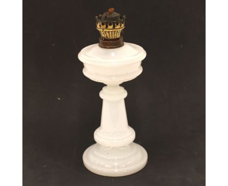 An opaque glass oil lamp, 34cm high