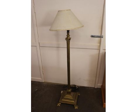 A brass Corinthian column standard lamp, 150cm high