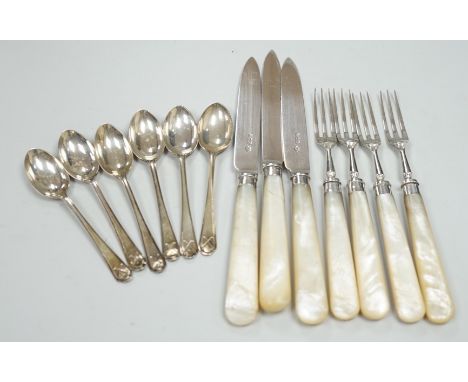 A set of six George V golfing related teaspoons, Walker &amp; Hall, Sheffield, 1933 and seven mother of pearl handled silver 