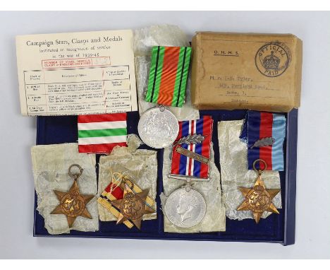 A WWII group of 5 including war medal with oak leaf and 1939-45 star with oak leaf to L.E. TYLER, 8th Army bar (with named bo