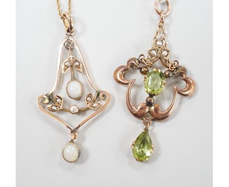 An early 290th century 9ct, peridot and seed pearl set drop pendant, overall 44mm and a similar yellow metal, white opal and 