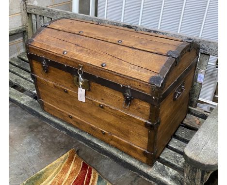 A Victorian metal bound domed top trunk, width 76cm, depth 44cm, height 52cm
