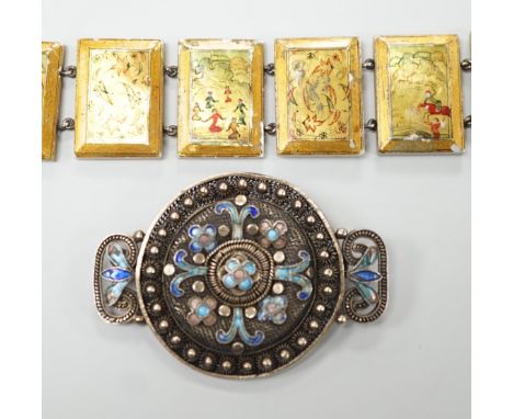 A Persian lacquered mother of pearl panel bracelet, 17cm and a Chinese filigree white metal and 'kingfisher' enamelled brooch
