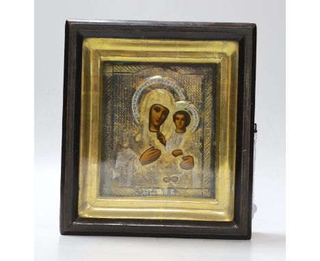 A 20th century Russian painted wood icon of Madonna and Child, with silver-gilt oklad, in gilt frame, 19.5 x 17.5cm