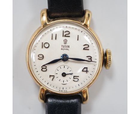 A lady's 1950's 9ct gold Tudor Royal manual wind wrist watch, with Arabic dial and subsidiary seconds, on associated leather 