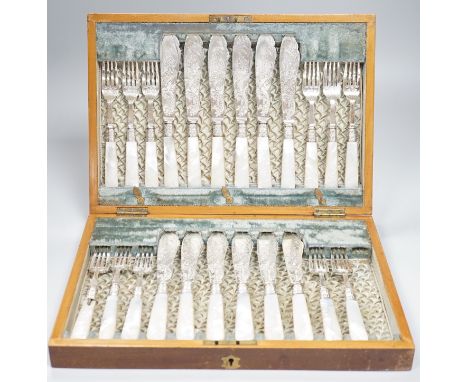 A cased set of twelve pairs of Victorian mother of pearl handed silver fish eaters (fork missing) R.F. Mosley &amp; Co, Sheff
