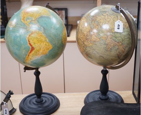 A Greaves &amp; Thomas 12" Present Day Globe, scale 1:42 on turned stained wooden stand, together with another globe. Tallest