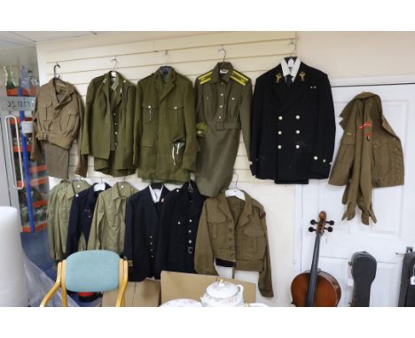 A collection of mixed Royal Navy and army military uniforms, including Royal Australian Corps of Signals (woman’s), Royal Art