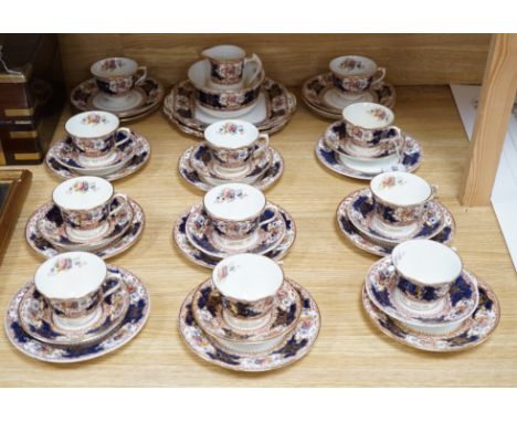 A Crown Staffordshire tea service decorated in white and gilt (46 pieces)