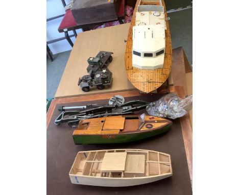 2 wooden boxes containing part scratch built boats/tug and plastic US army jeep. All as found, with wear, and losses 