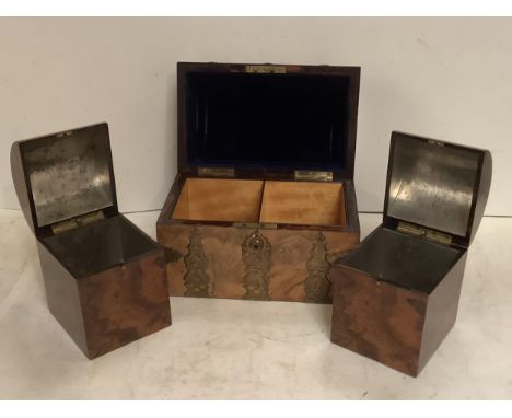 A burr walnut sprung lidded and lead lined, two division tea caddy (some fading to outside) 