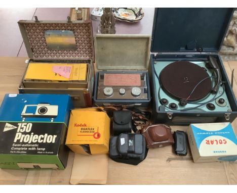 A quantity of vintage camera equipment, cameras, projector, vintage  record player/gramophone etc 