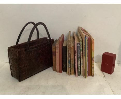 A quantity of children's vintage books, including "pop up" book, a vintage handbag and a Cartier jewellery box 