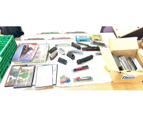 Large selection of train and railway accessories to include engines, DVDS, model railways etc 