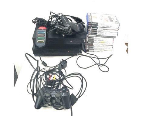 2 x  Play station 2s and a playstation 1 console, 5 controllers and a selection of assorted games, untested 