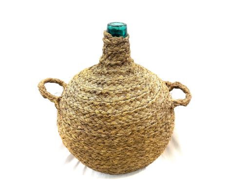 Vintage glass carboy demijohn with wicker holder 