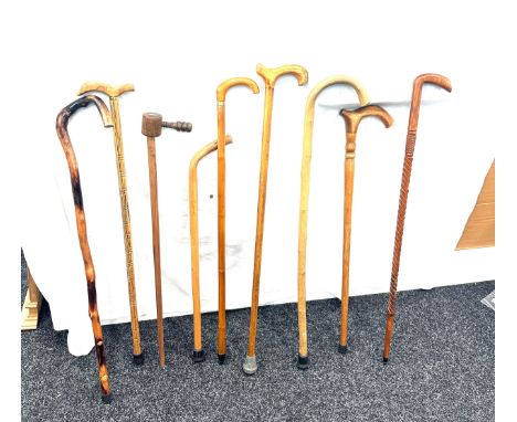 Selection of vintage walking sticks, various handle designs, some carved  (9 sticks in total) 