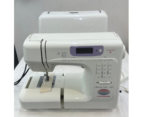 Janome Memory craft 4800 sewing machine, computerised, Model MC 4800, untested with cabinet and sewing accessories, cabinet m