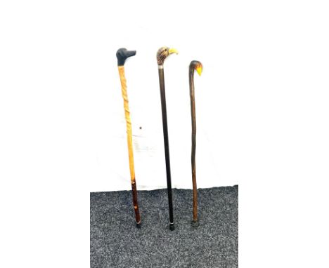 Selection of 3 vintage wooden walking sticks, with animal feature handles, duck, dog, eagle 