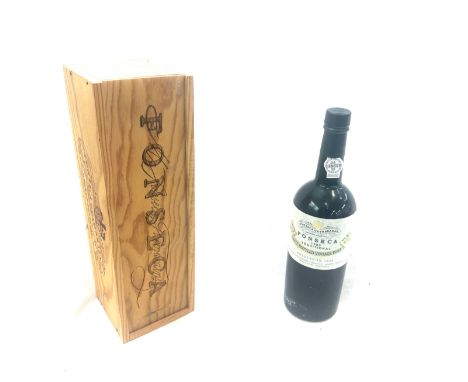 Bottle of vintage Fonseca 1983 late bottles vintage port in a wooden crate 