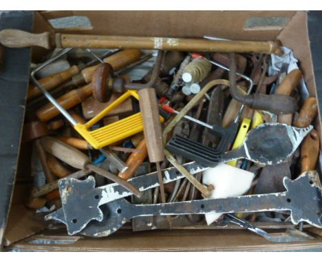 A selection of vintage tools, including chisels, saws, a Mysto syringe, with many other items