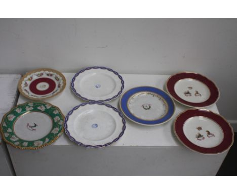 A quantity of commemorative armorial plates including two marked with the emblem 'Heart in hand' blue and gilt rims, kite mar