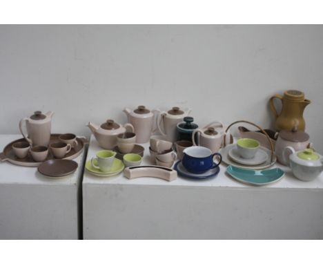 A selection of Poole Pottery including Twintone brown and cream, green and grey namely various tea cups, coffee cups, ceramic