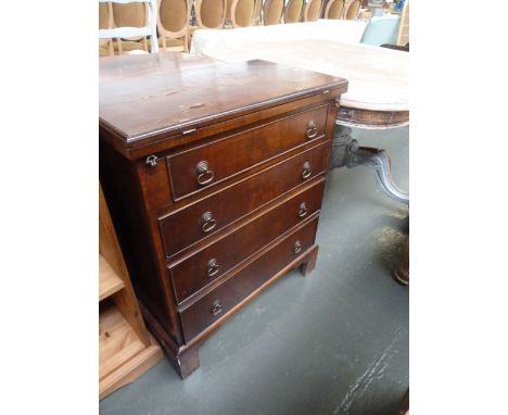 A 20th century mahogany four drawer chest, hinged fold out top raised on bracket feet, 65cm x 76cm