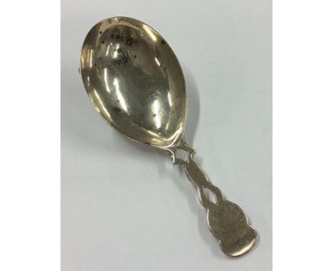 A rare Georgian silver caddy spoon with pierced handle. London 1812. Approx. 11 grams. Est. £30 - £40.