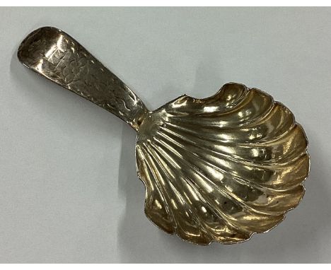 An 18th Century George III silver caddy spoon. Sheffield 1784. Approx. 10 grams. Est. £60 - £80.