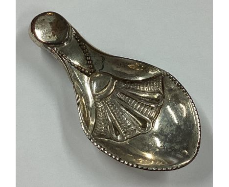 An Old Sheffield Plate caddy spoon. Circa 1820. Est. £10 - £20.