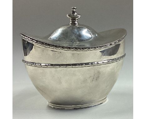 A silver tea caddy / biscuit box with hinged lid. Approx. 182 grams. Est. £150 - £200.