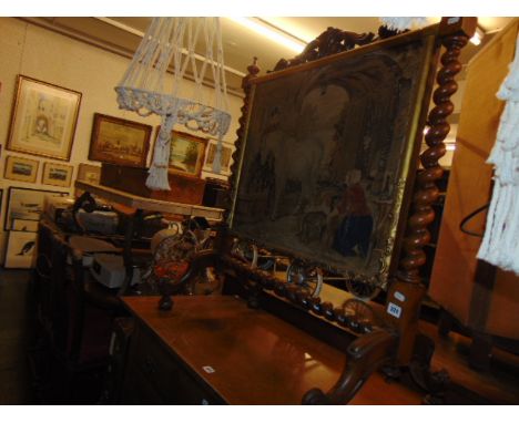 A barley twist tapestry fire screen