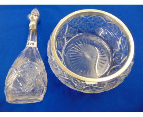 A cut glass fruit bowl with HM Silver rim and a Silver topped European 800 decanter