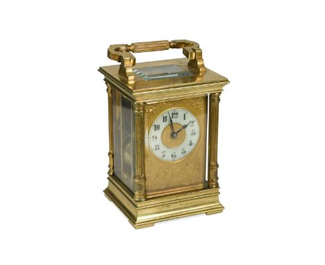 A French gilt brass carriage clock circa 1900, with engraved inscription to the top 'Annie August 27th 1912', cream annular r