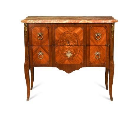 A French Transitional style kingwood breakfront commode, 19th century, the moulded marble top above two long drawers with flo