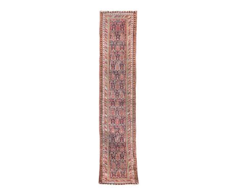 A Persian runner, circa 1910, with a boteh field on an indigo ground452 x 94cmGood quality wool and construction and pleasant
