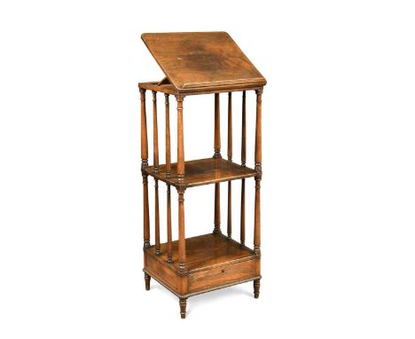 A George IV rosewood three-tier whatnot, the top with hinged reading slope over turned tapering column supports, frieze drawe
