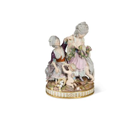 A Meissen figure group 'The Broken Egg', after the model by M. V. Acier, late 19th century,   modelled as a young lady turned
