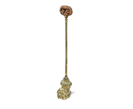 An over-scale gilt brass lion paw door porter, 19th century, 75cm highString fabric wrapped around the handle quite tatty and