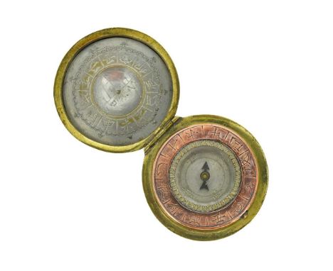 A Chinese silvered circular compass, 18th or 19th century, with moulded foliate case enclosing engraved interior with copper 